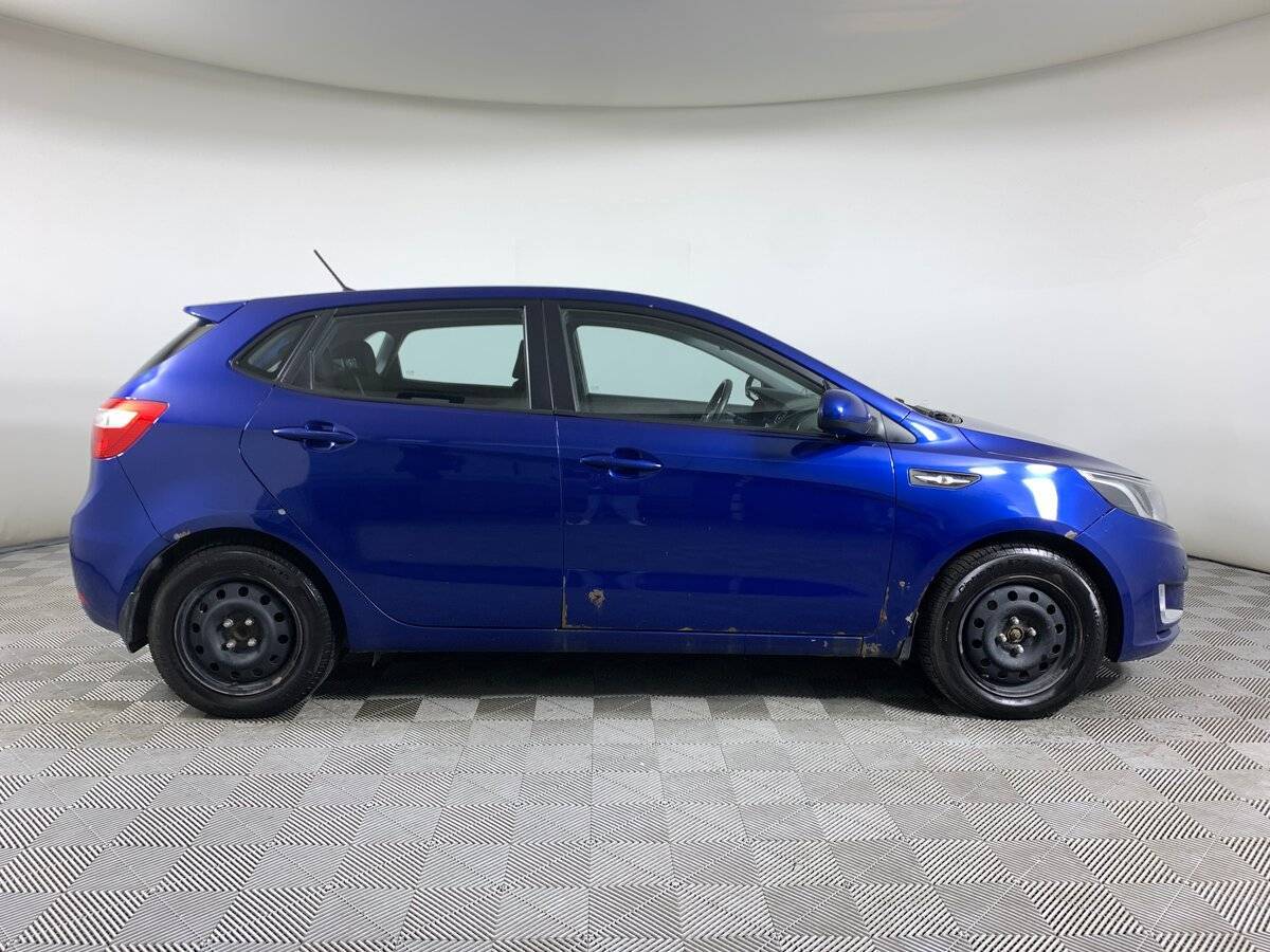 Kia Rio с пробегом — 2013 год. Фото: #3