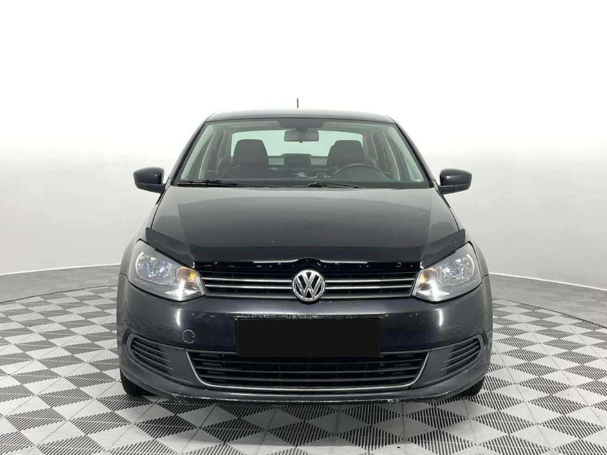 Volkswagen Polo с пробегом — 2013 год. Фото: #1