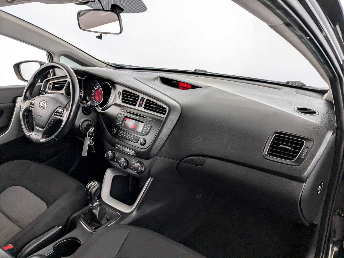 Kia Ceed с пробегом — 2014 год. Фото: #10