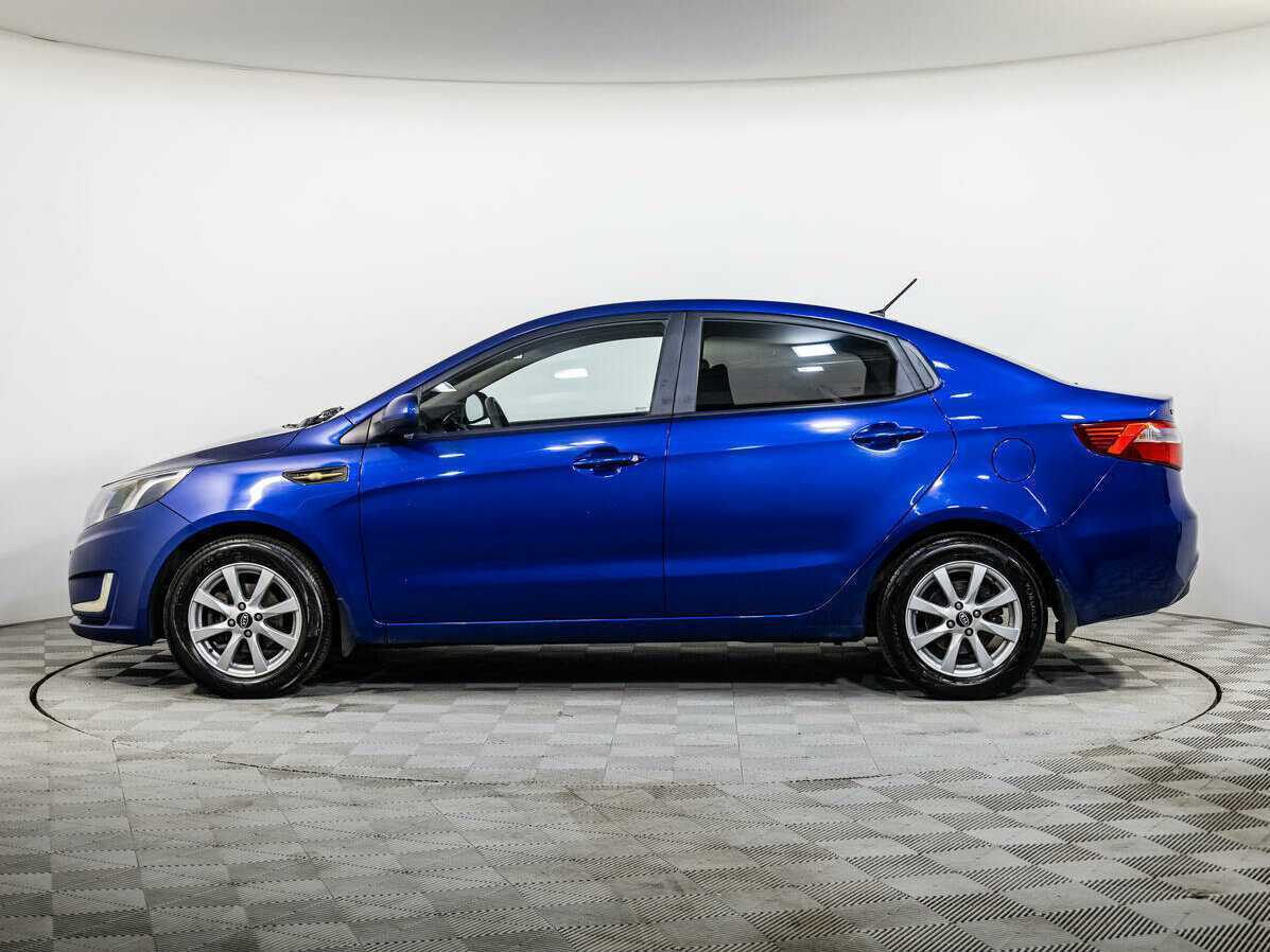 Kia Rio с пробегом — 2013 год. Фото: #6