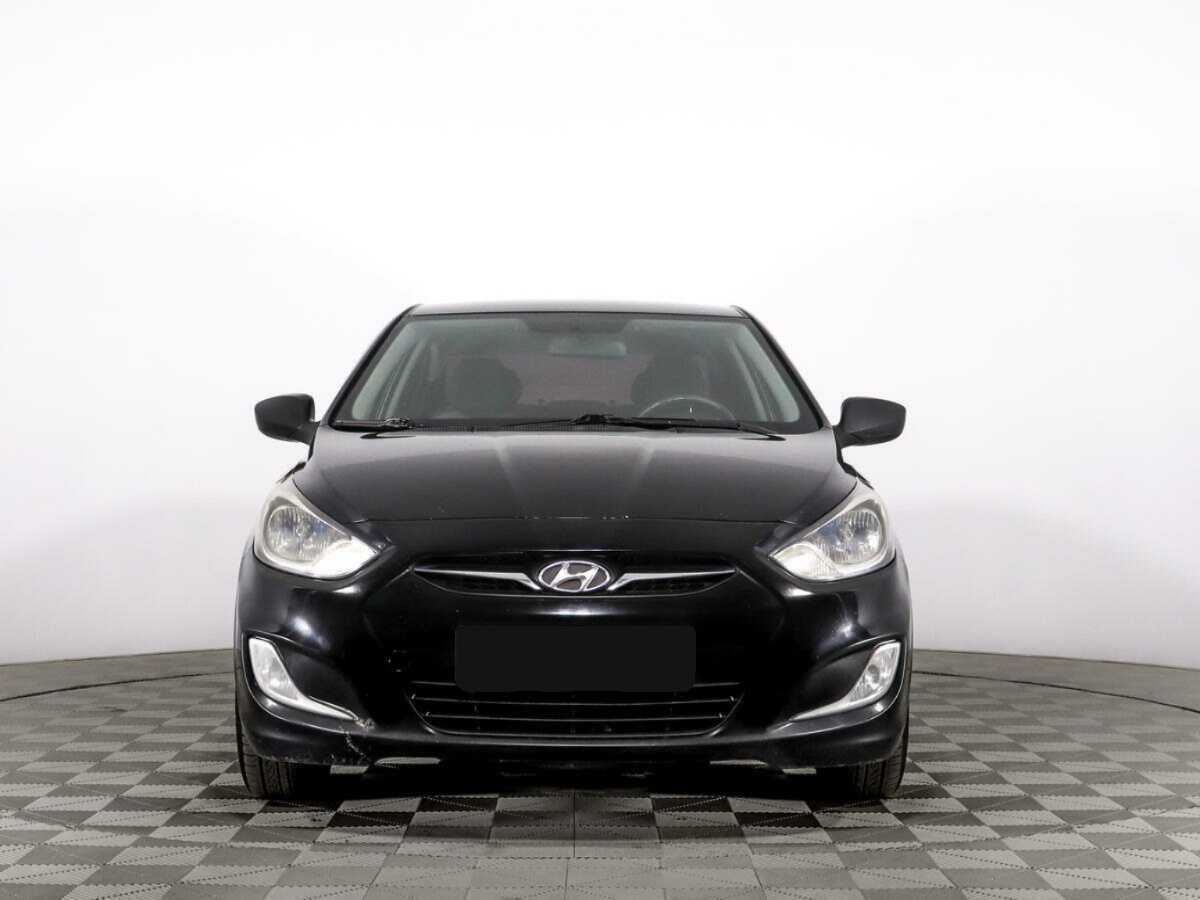 Hyundai Solaris с пробегом — 2013 год. Фото: #1