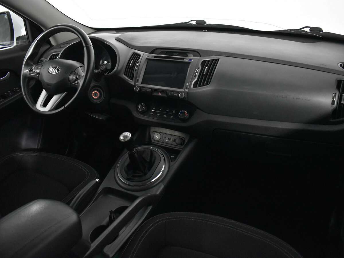 Kia Sportage с пробегом — 2012 год. Фото: #9