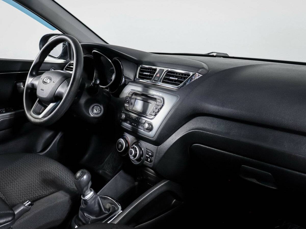 Kia Rio с пробегом — 2013 год. Фото: #6