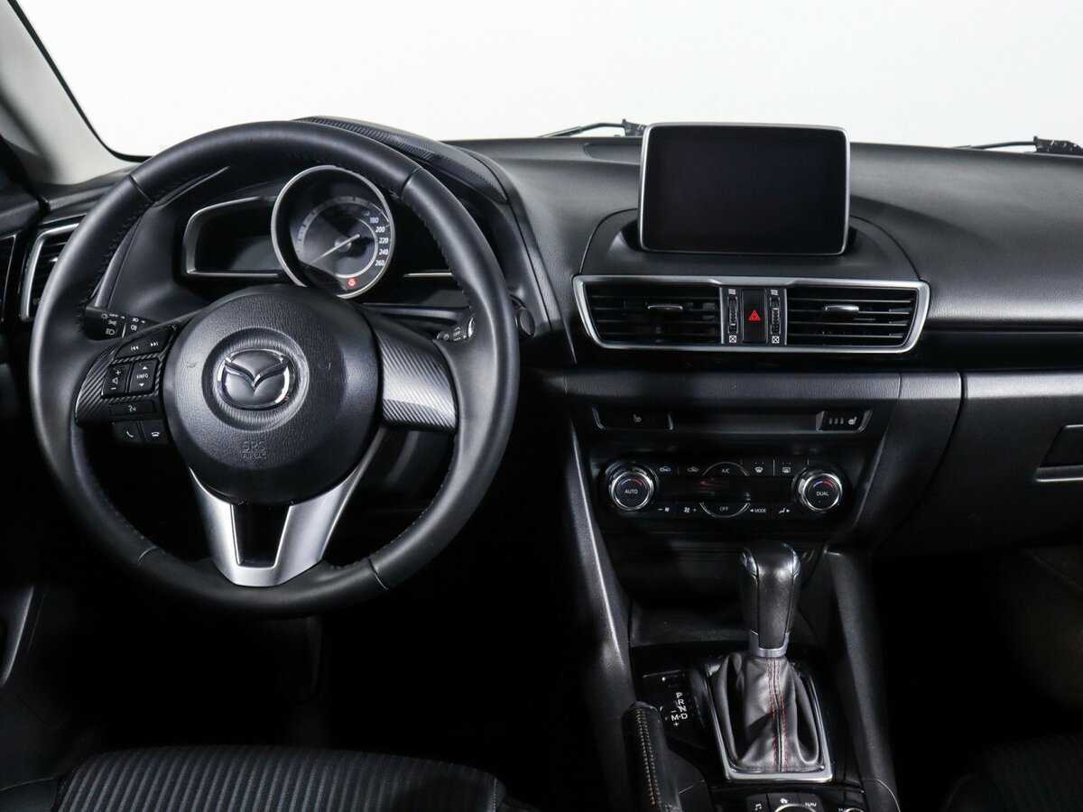 Mazda 3 с пробегом — 2014 год. Фото: #11
