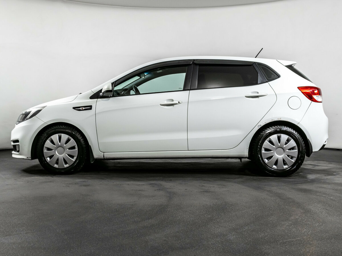 Kia Rio с пробегом — 2015 год. Фото: #7