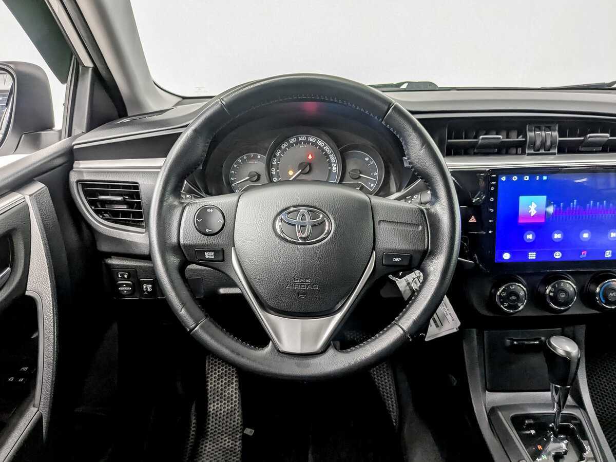 Toyota Corolla с пробегом — 2014 год. Фото: #20