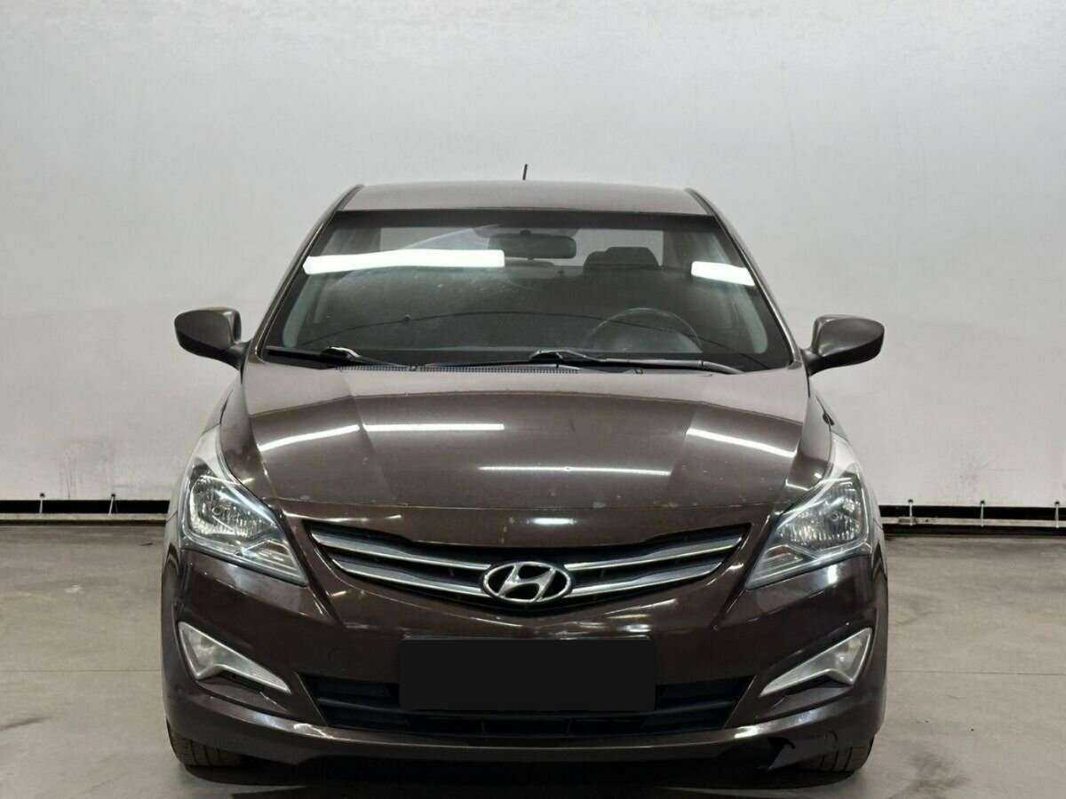 Hyundai Solaris с пробегом — 2015 год. Фото: #1