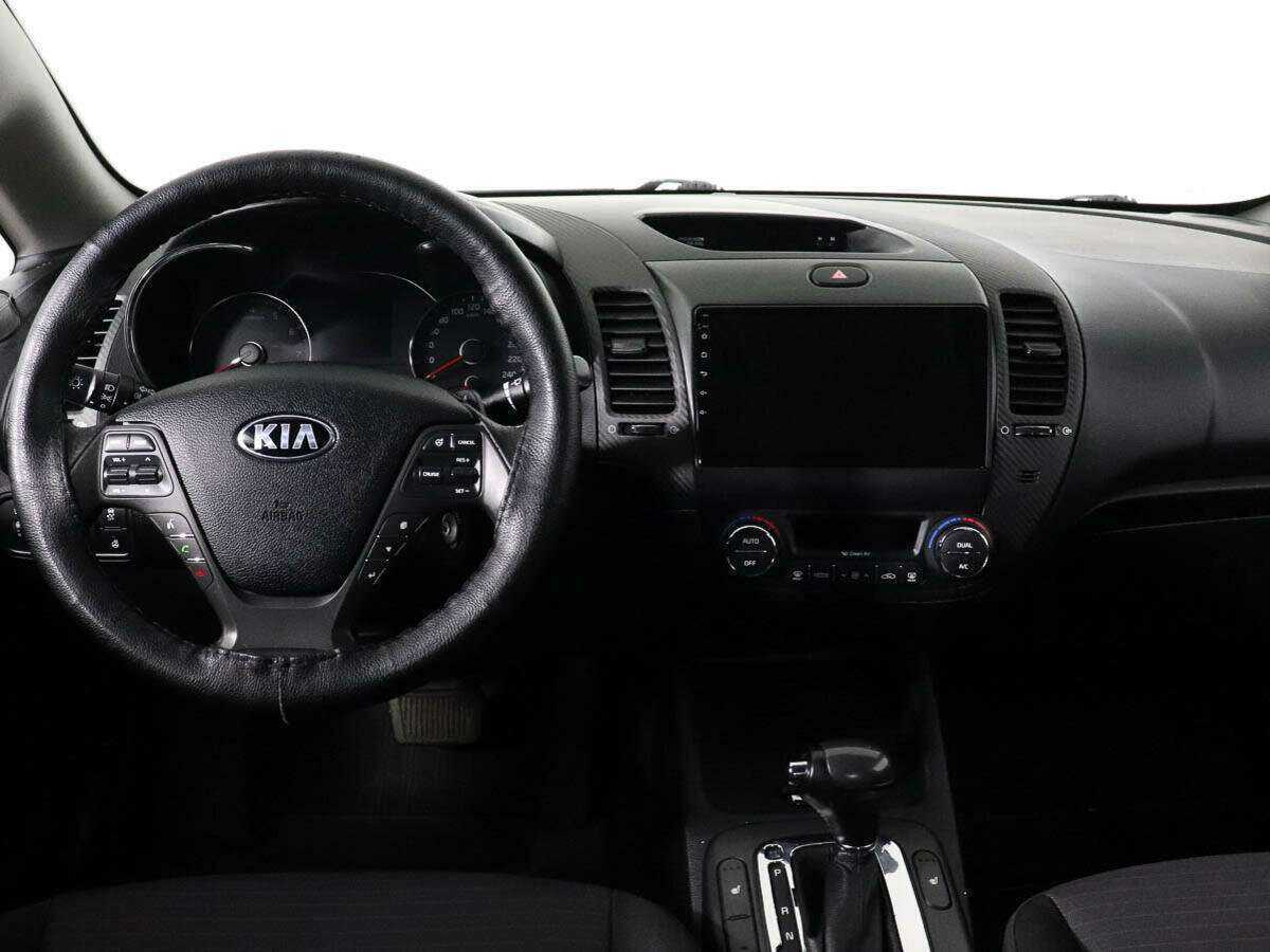 Kia Cerato с пробегом — 2015 год. Фото: #9