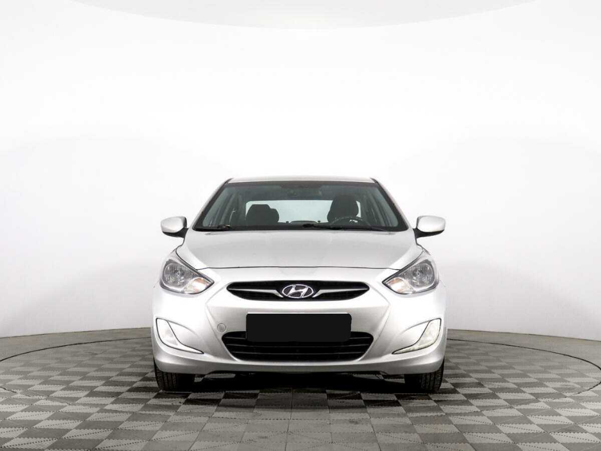 Hyundai Solaris с пробегом — 2013 год. Фото: #1