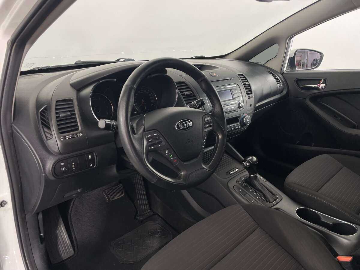 Kia Cerato с пробегом — 2014 год. Фото: #6