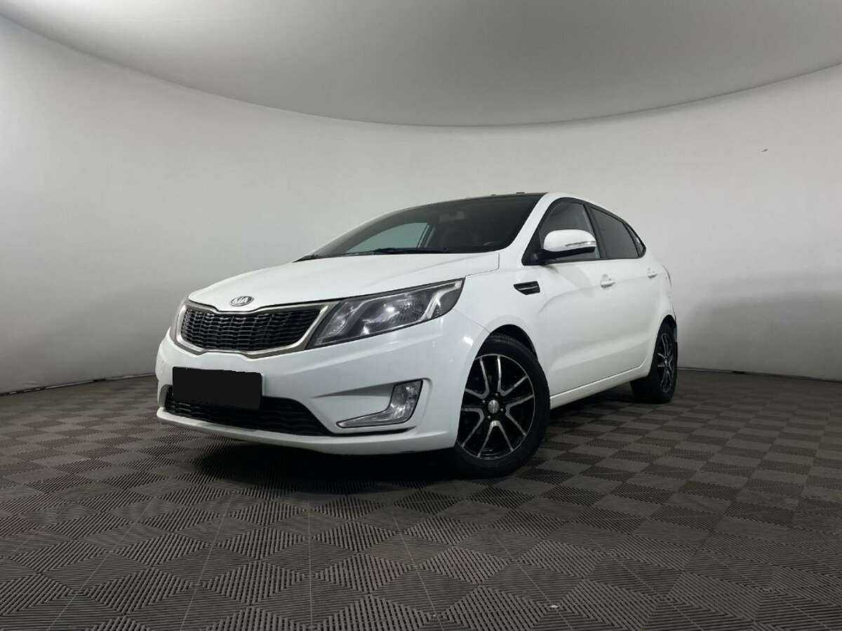 Kia Rio с пробегом — 2013 год. Фото: #0