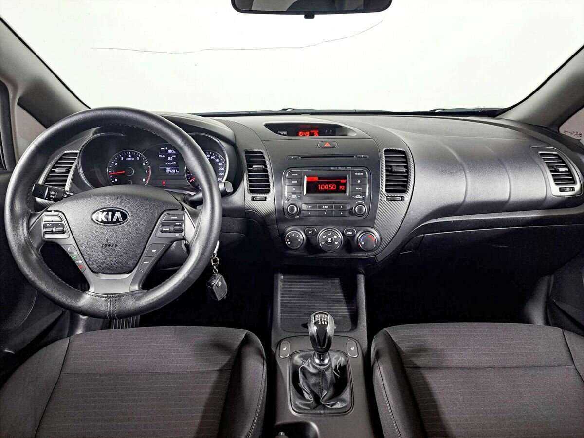 Kia Cerato с пробегом — 2014 год. Фото: #11
