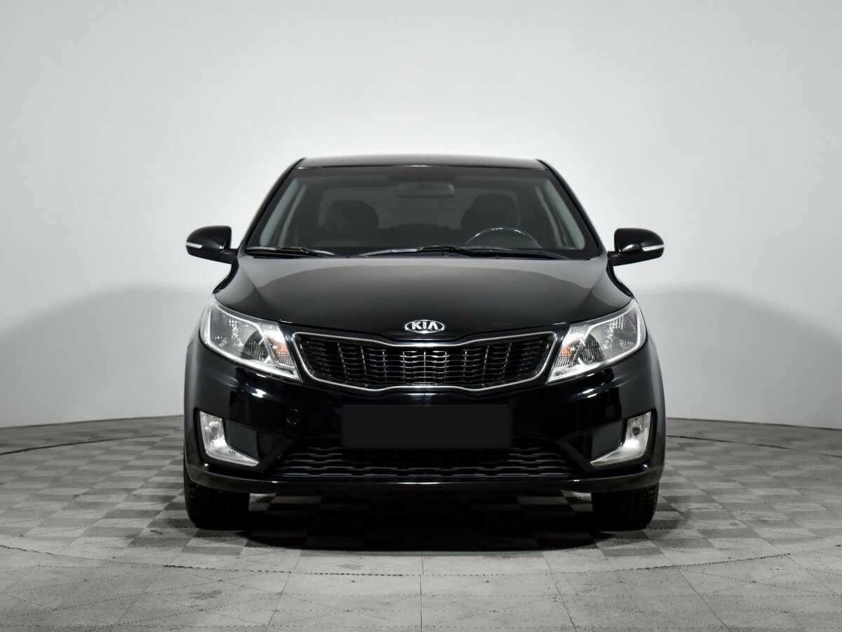 Kia Rio с пробегом — 2013 год. Фото: #1