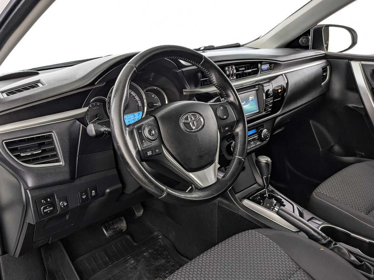 Toyota Corolla с пробегом — 2014 год. Фото: #12
