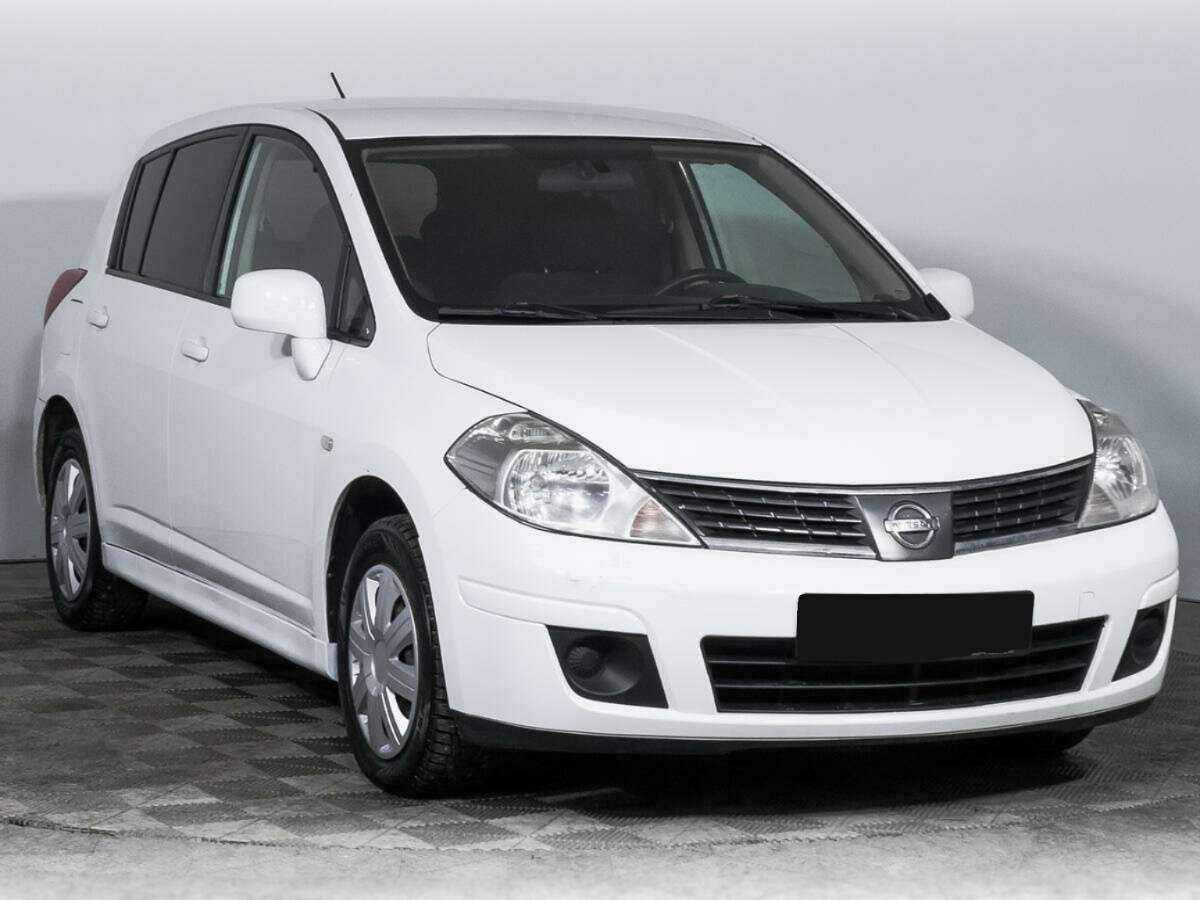 Nissan Tiida с пробегом — 2013 год. Фото: #2