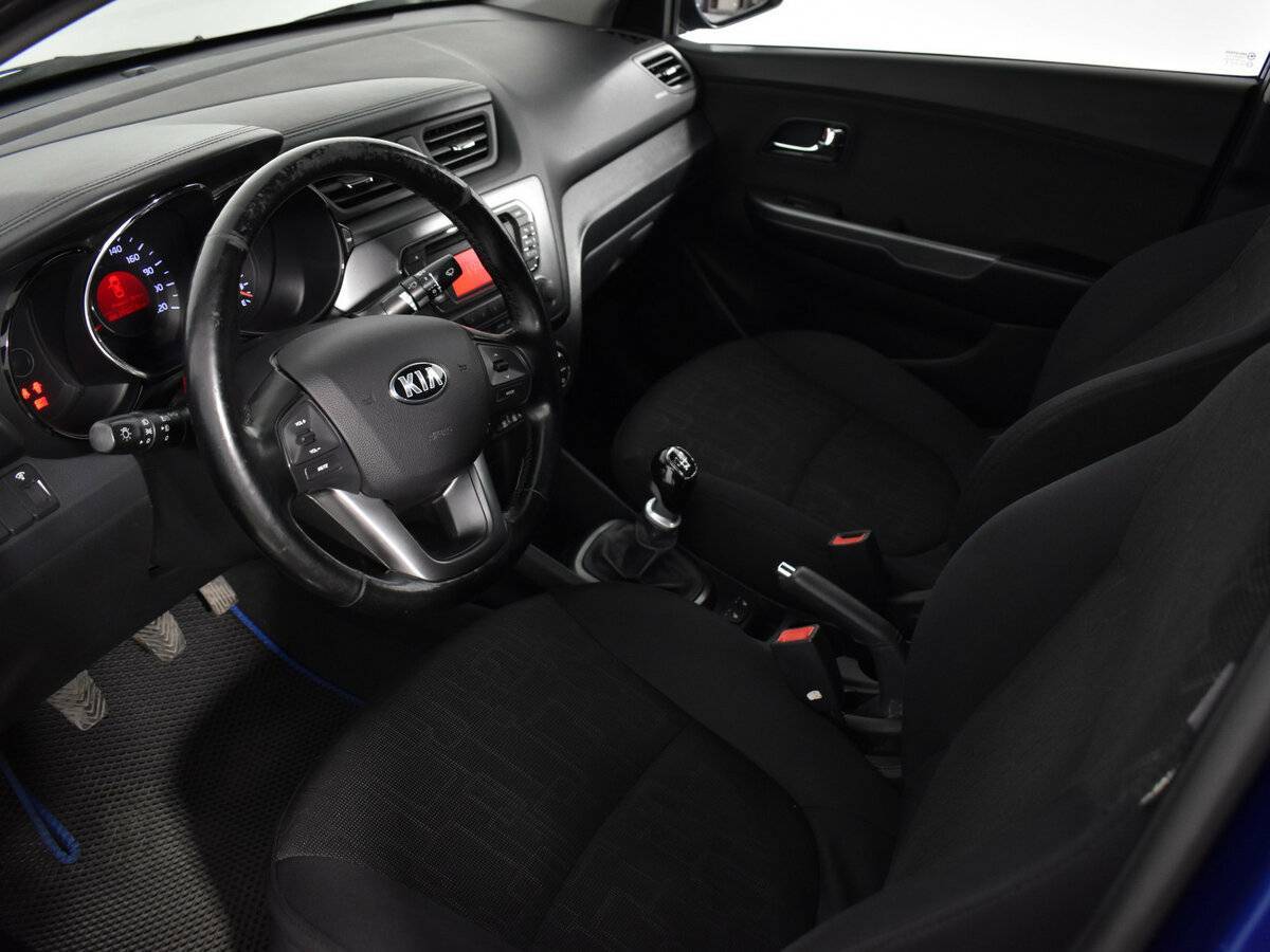 Kia Rio с пробегом — 2013 год. Фото: #8