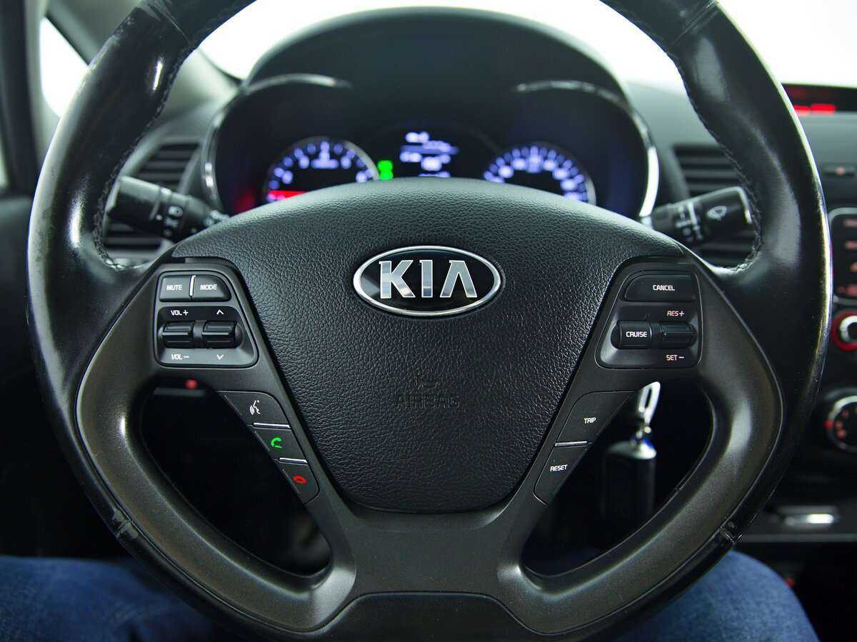 Kia Cerato с пробегом — 2014 год. Фото: #11