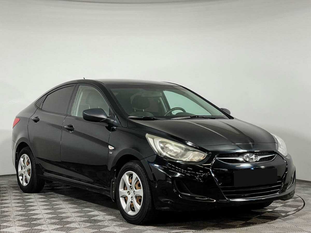 Hyundai Solaris с пробегом — 2012 год. Фото: #2