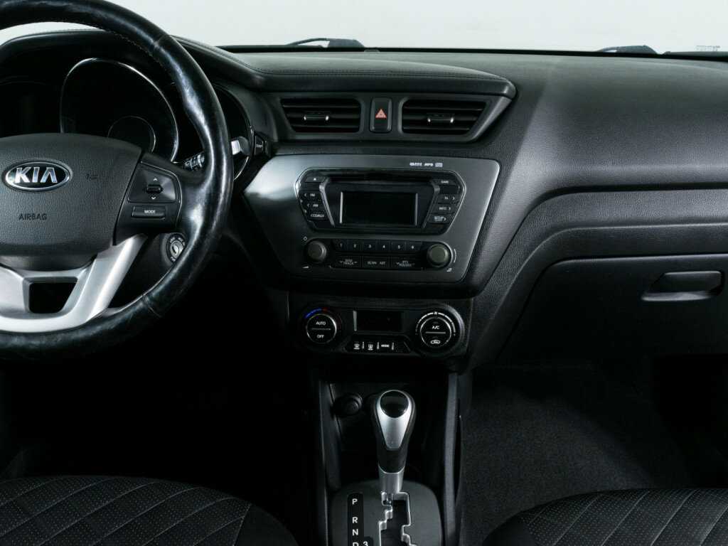 Kia Rio с пробегом — 2013 год. Фото: #7