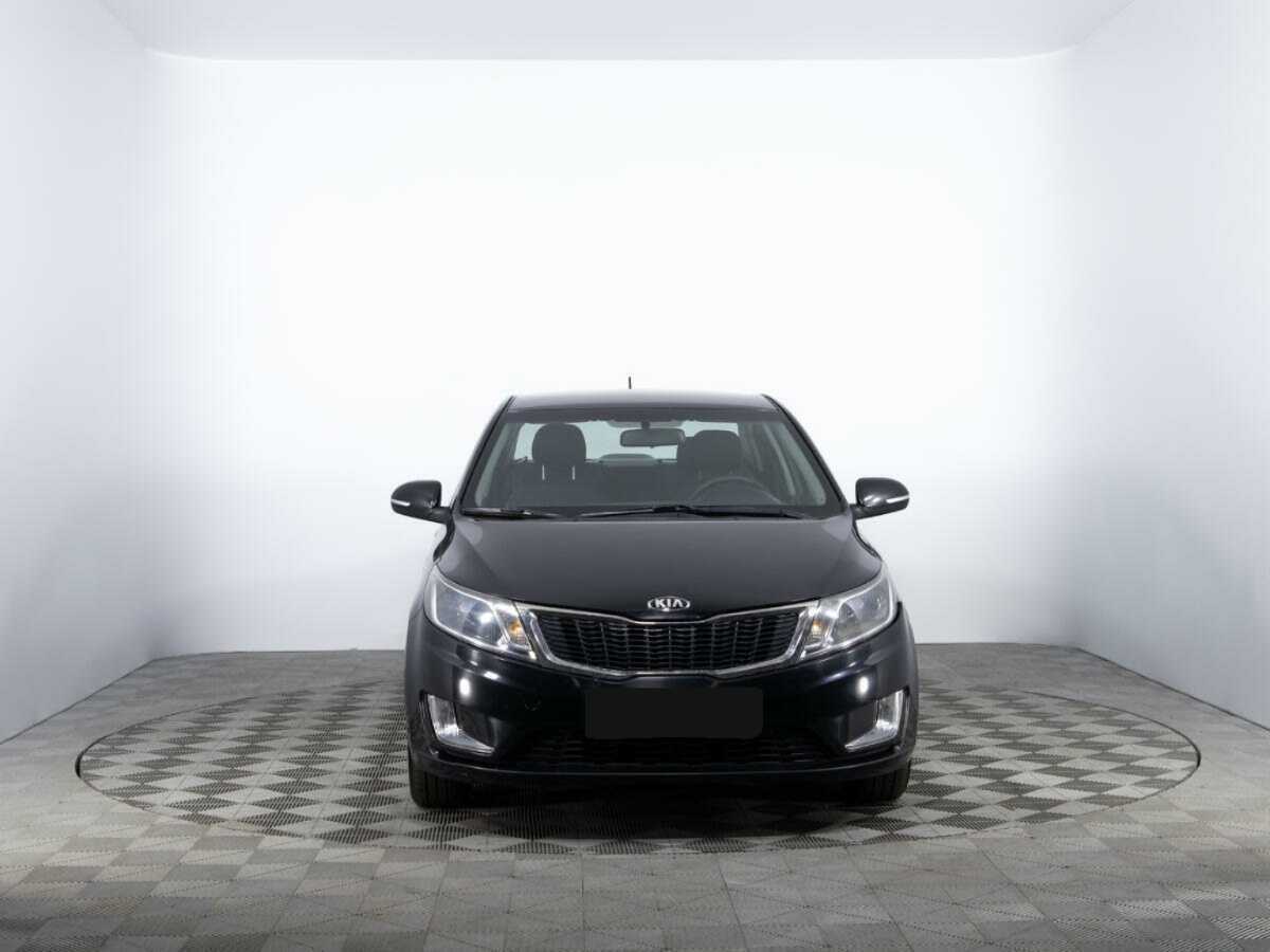 Kia Rio с пробегом — 2014 год. Фото: #1