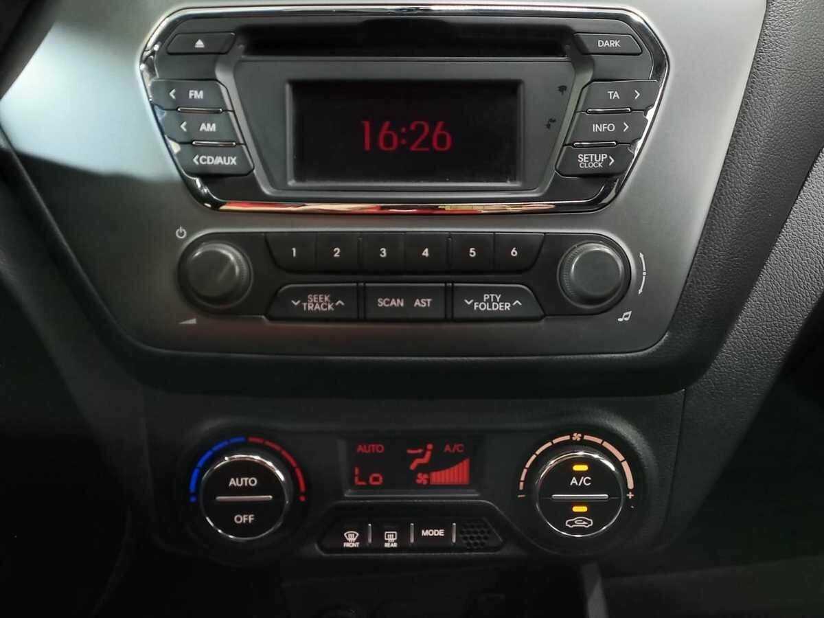Kia Rio с пробегом — 2013 год. Фото: #11