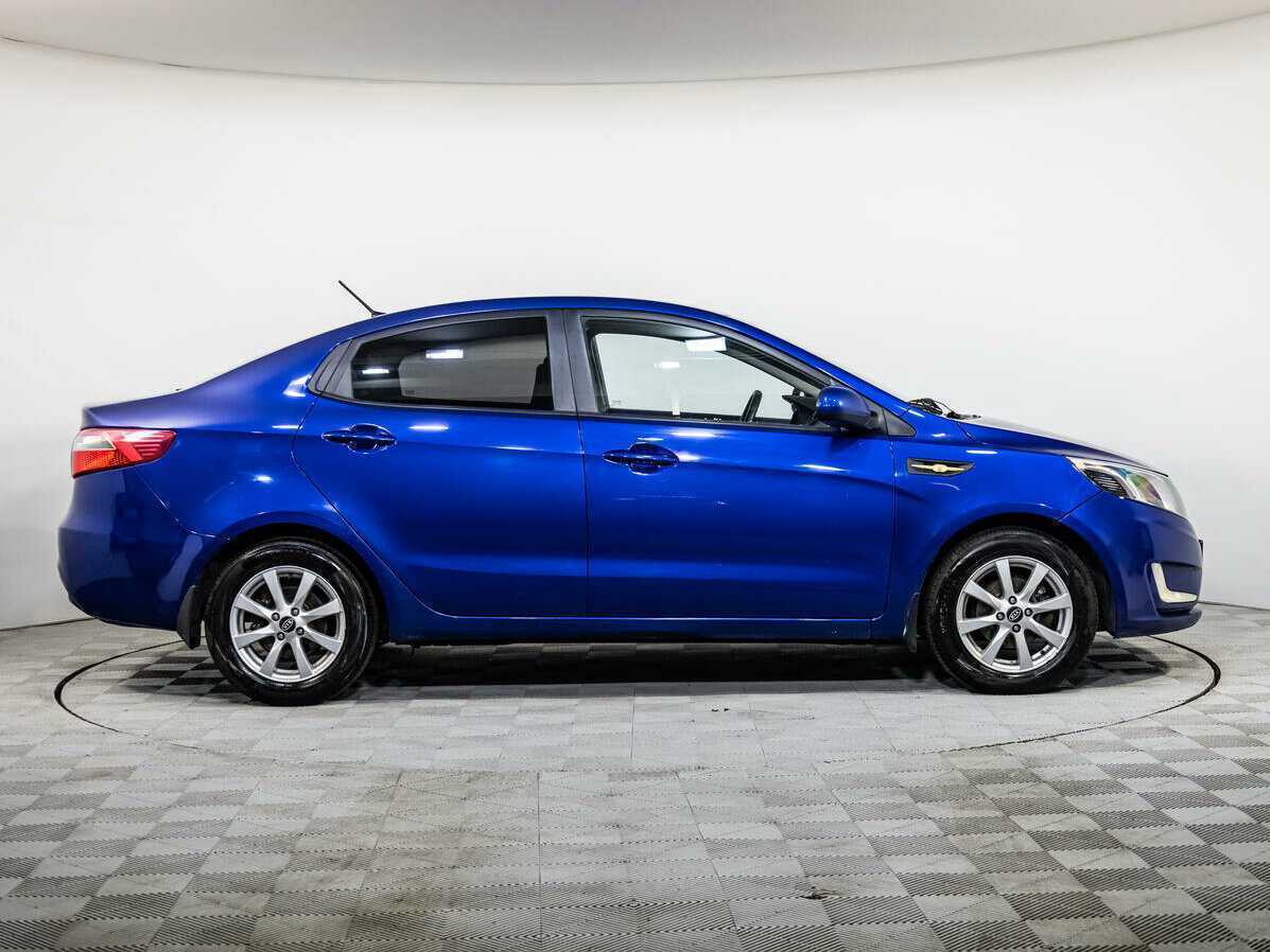 Kia Rio с пробегом — 2013 год. Фото: #2