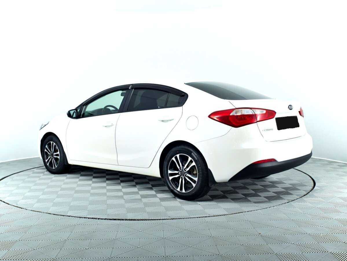Kia Cerato с пробегом — 2014 год. Фото: #6