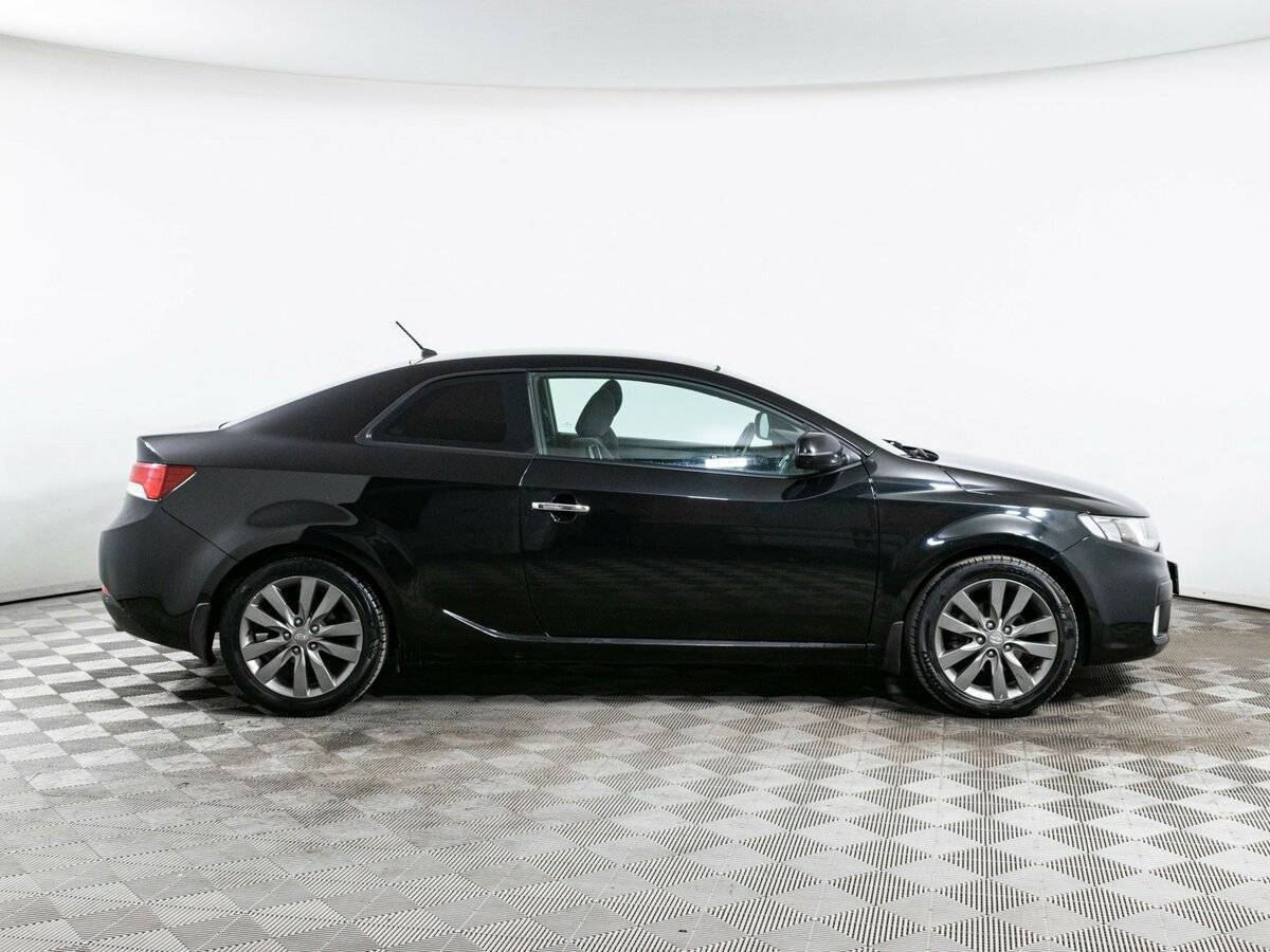 Kia Cerato с пробегом — 2012 год. Фото: #3