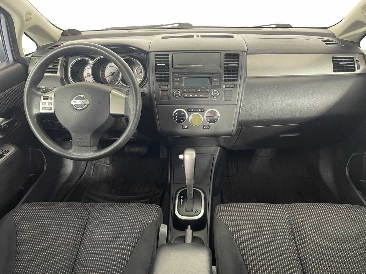 Nissan Tiida с пробегом — 2013 год. Фото: #6