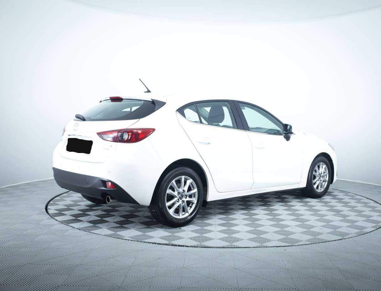 Mazda 3 с пробегом — 2014 год. Фото: #4