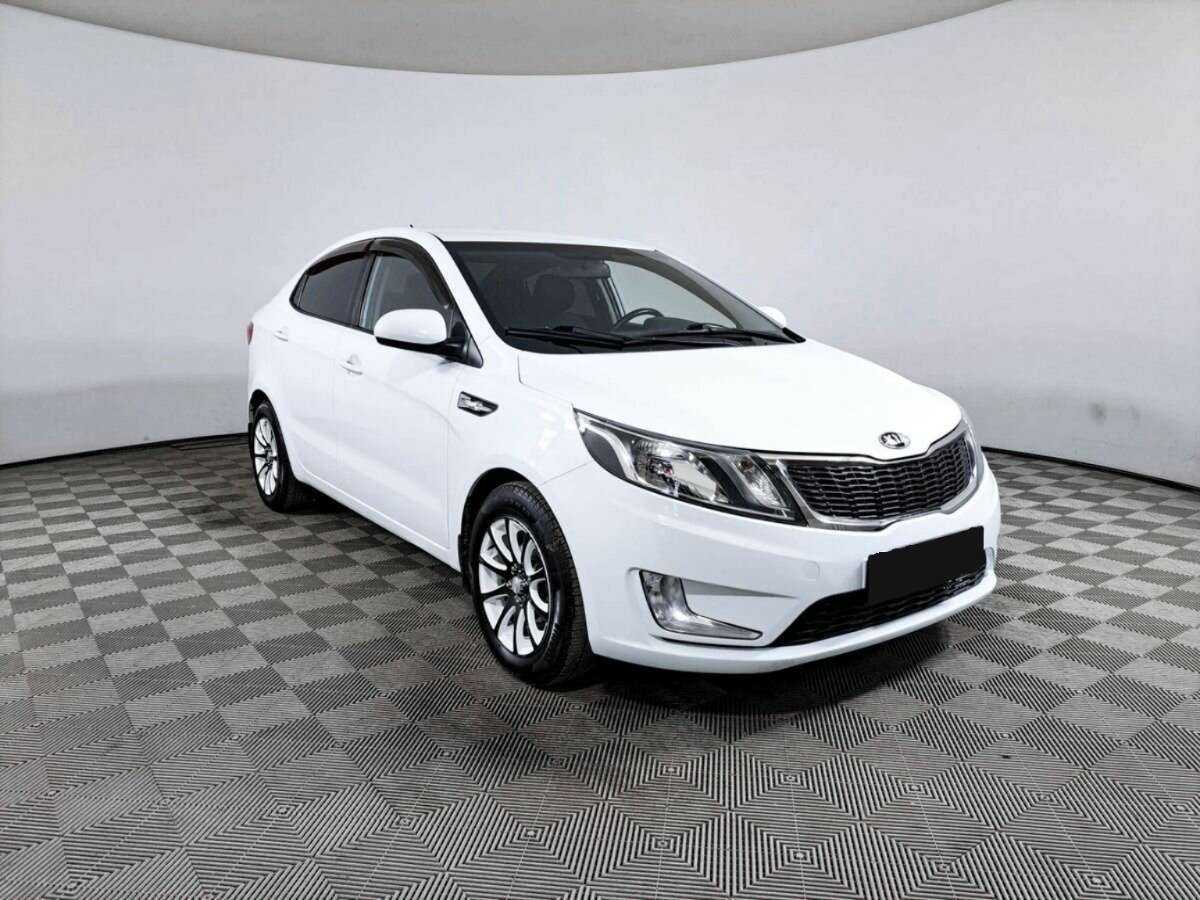 Kia Rio с пробегом — 2014 год. Фото: #2