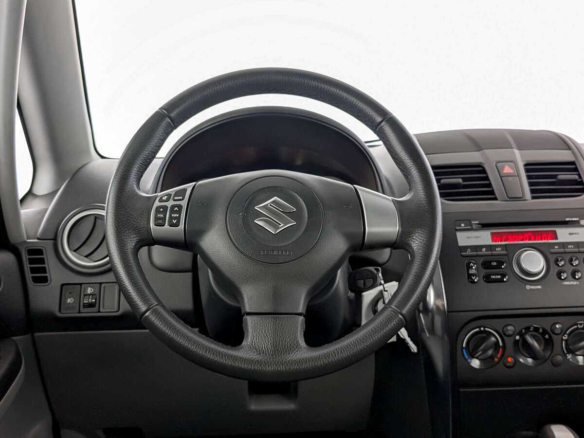 Suzuki SX4 с пробегом — 2013 год. Фото: #16