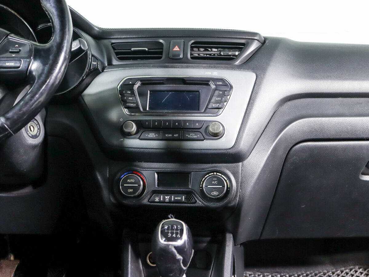 Kia Rio с пробегом — 2014 год. Фото: #12