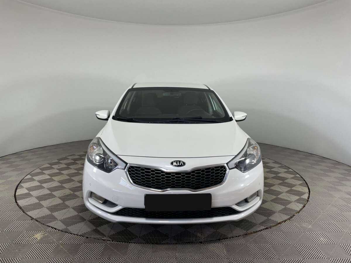 Kia Cerato с пробегом — 2014 год. Фото: #1