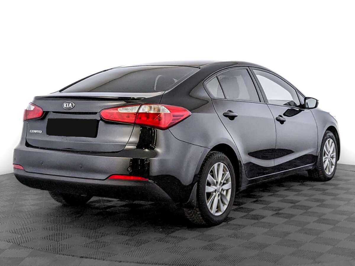 Kia Cerato с пробегом — 2015 год. Фото: #4