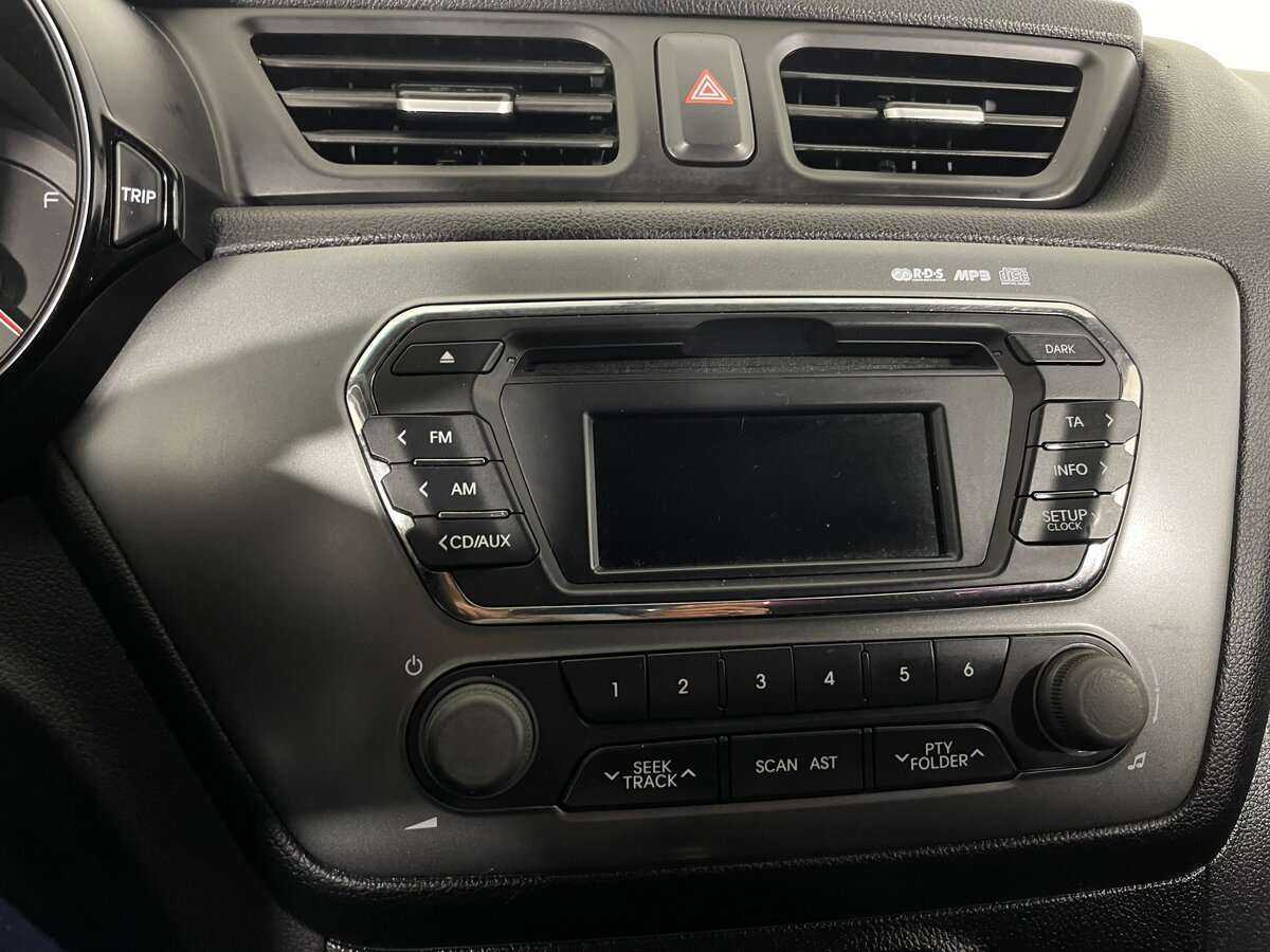 Kia Rio с пробегом — 2013 год. Фото: #11