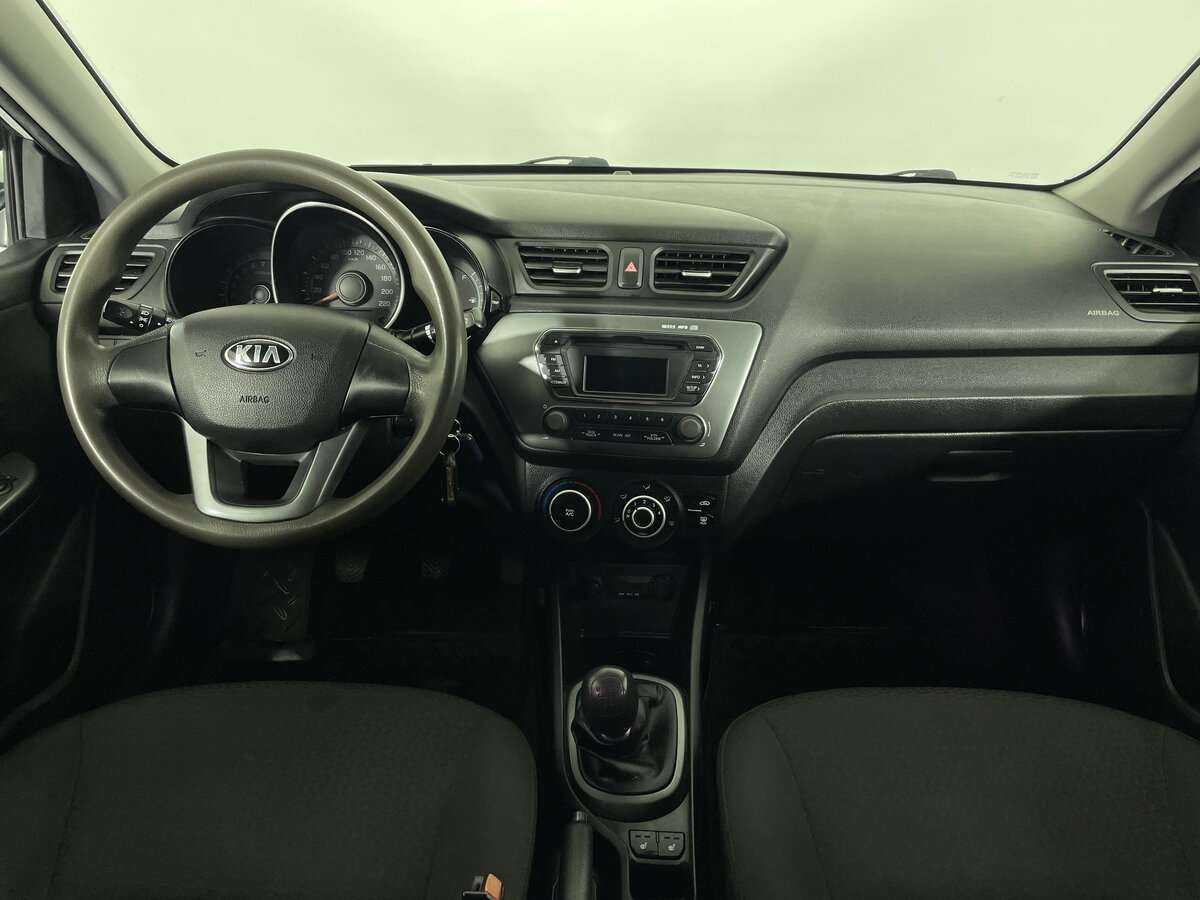 Kia Rio с пробегом — 2013 год. Фото: #7