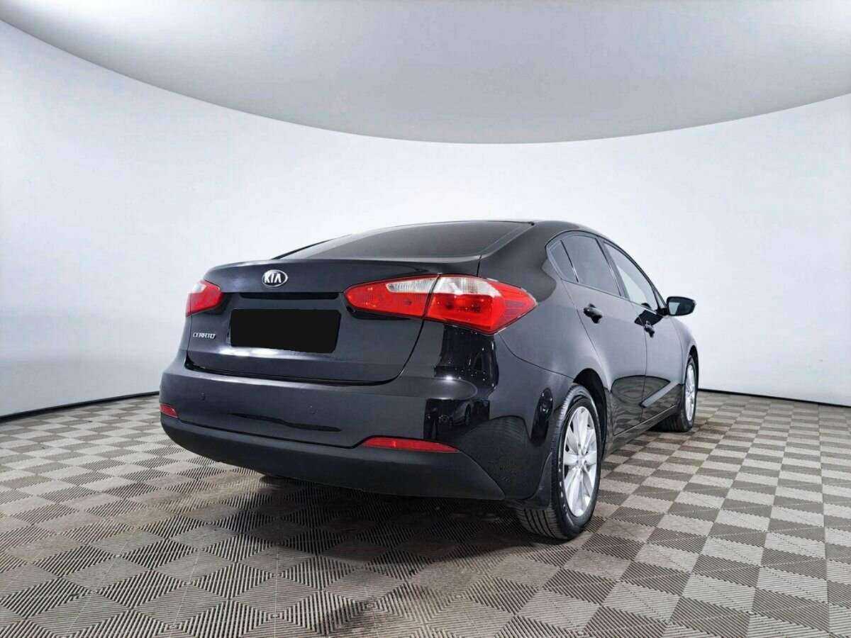 Kia Cerato с пробегом — 2014 год. Фото: #4