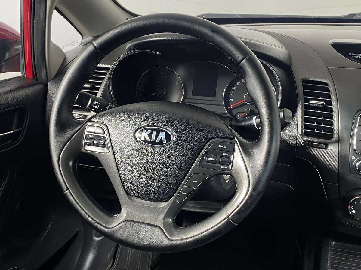 Kia Cerato с пробегом — 2013 год. Фото: #9