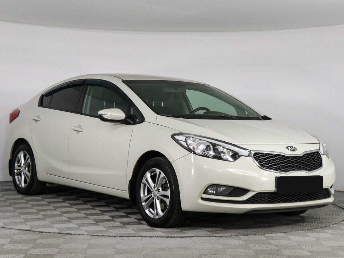 Kia Cerato с пробегом — 2013 год. Фото: #2