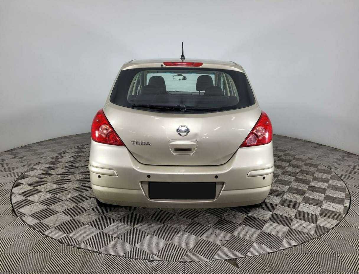 Nissan Tiida с пробегом — 2013 год. Фото: #2