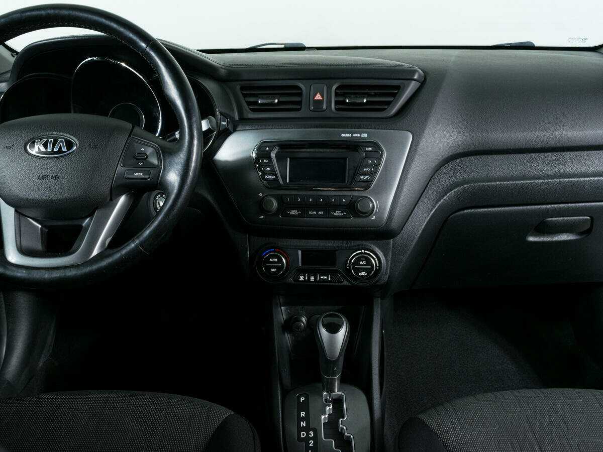 Kia Rio с пробегом — 2013 год. Фото: #8