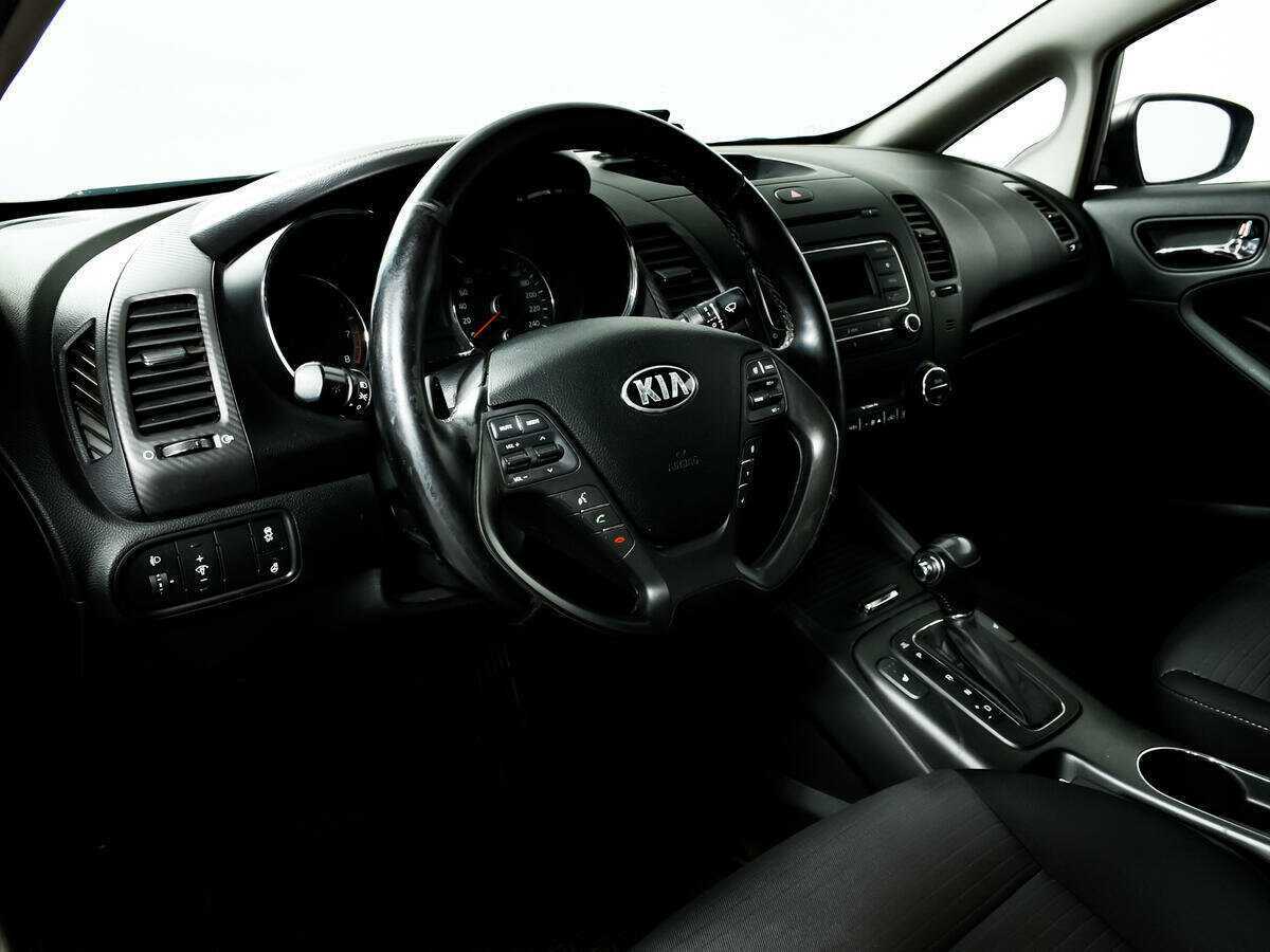 Kia Cerato с пробегом — 2014 год. Фото: #12