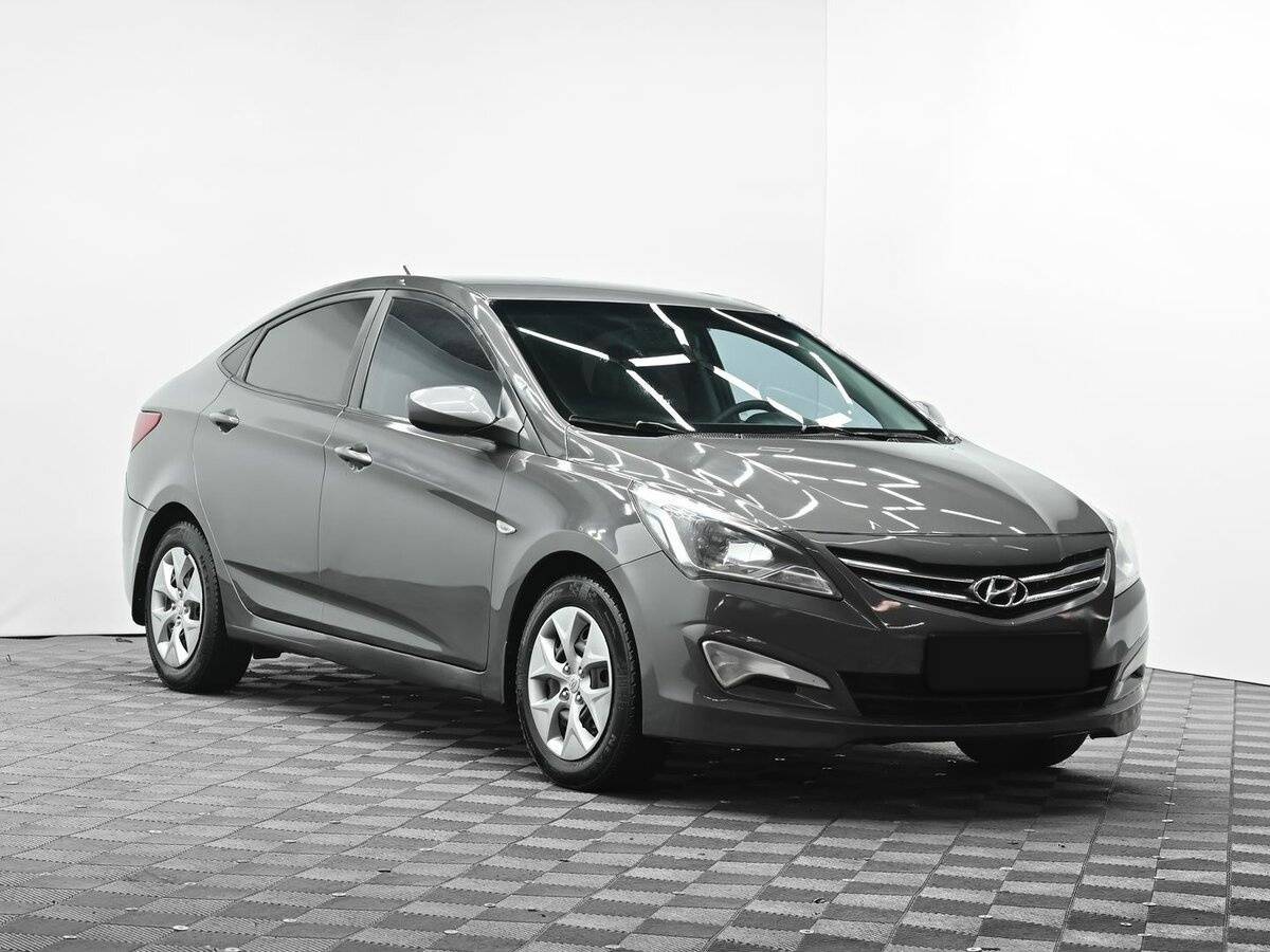 Hyundai Solaris с пробегом — 2014 год. Фото: #1