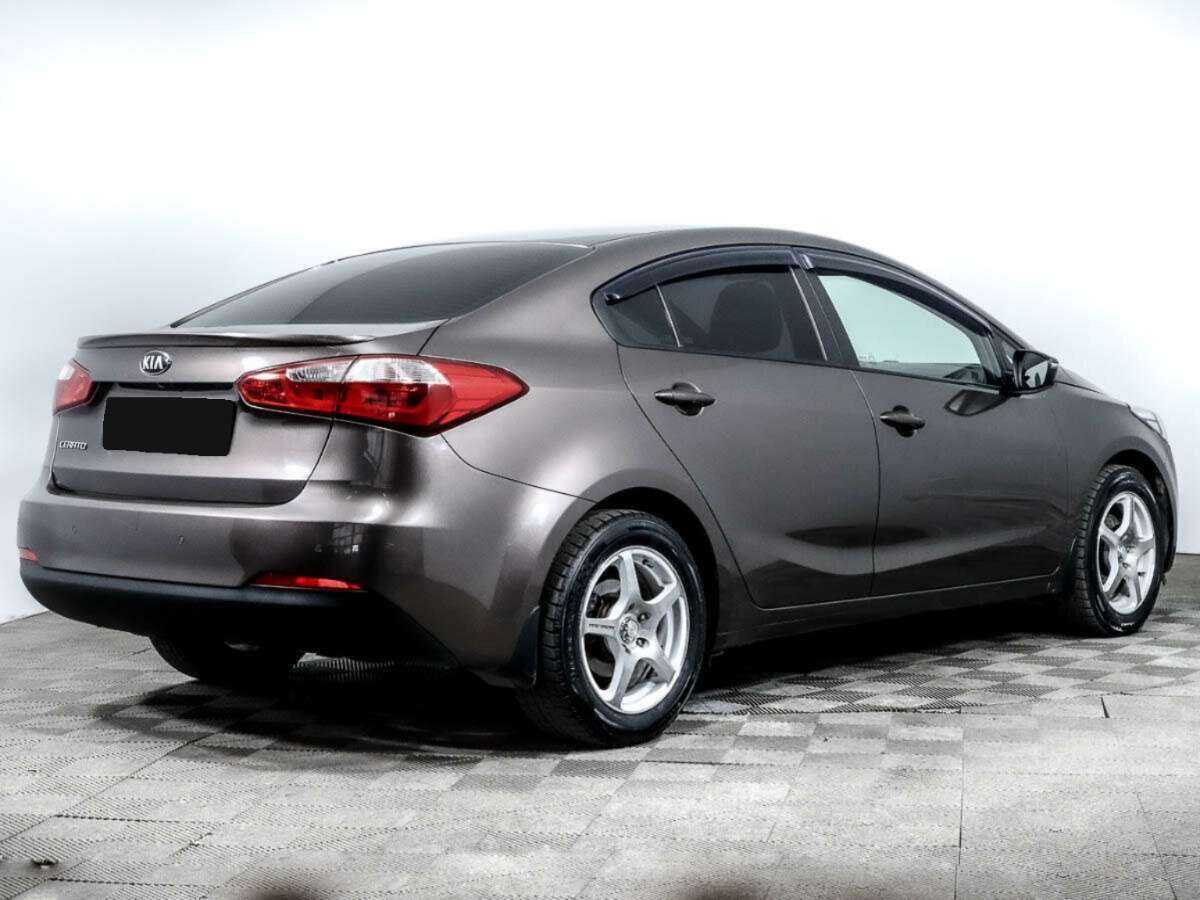 Kia Cerato с пробегом — 2015 год. Фото: #3