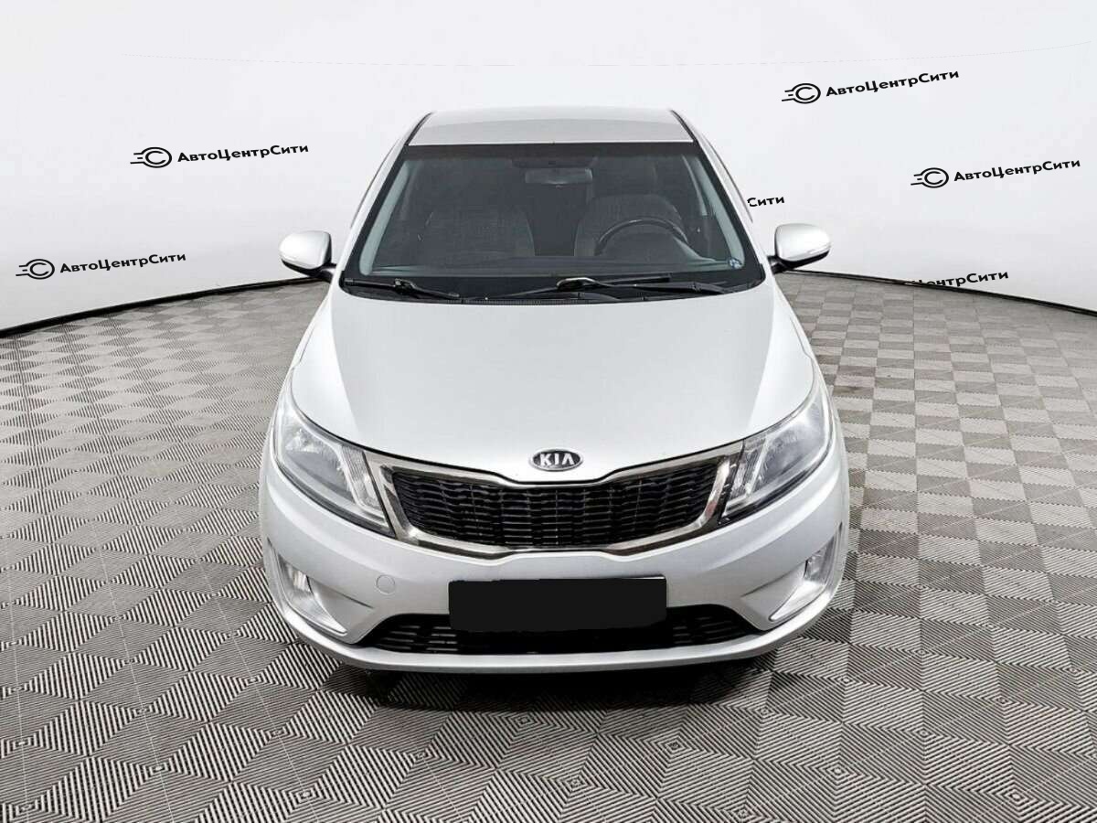 Kia Rio с пробегом — 2012 год. Фото: #1