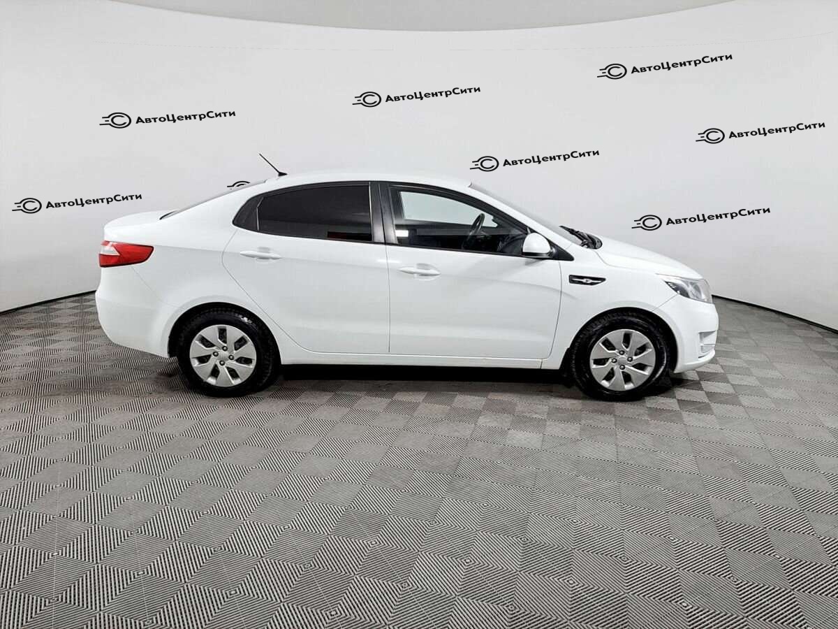 Kia Rio с пробегом — 2013 год. Фото: #3