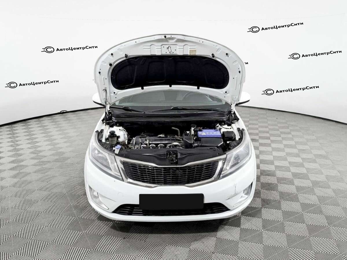 Kia Rio с пробегом — 2013 год. Фото: #8