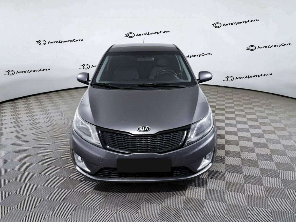 Kia Rio с пробегом — 2014 год. Фото: #1