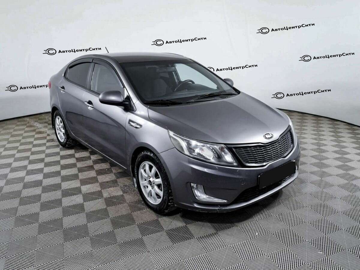 Kia Rio с пробегом — 2014 год. Фото: #2